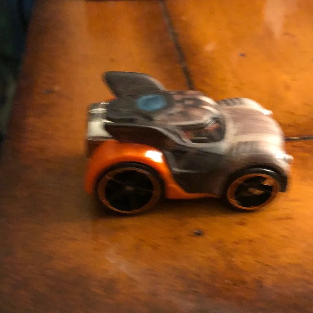 Die-Cast Toy Car in Metallic Brown with Orange Accents